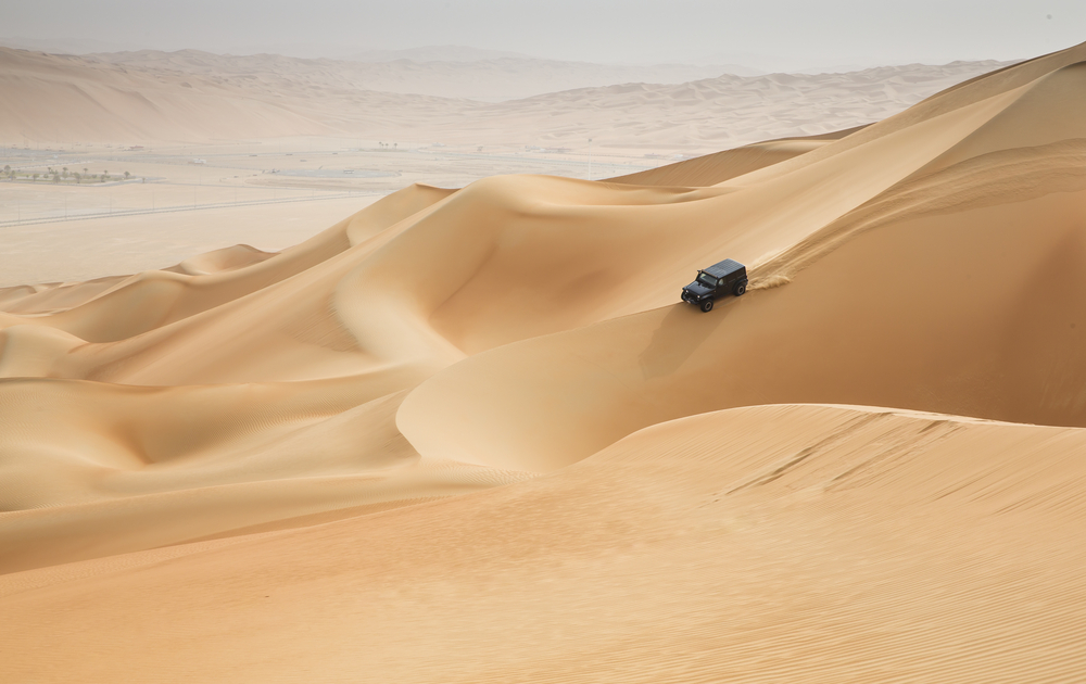 Dune bashing when visiting Oman